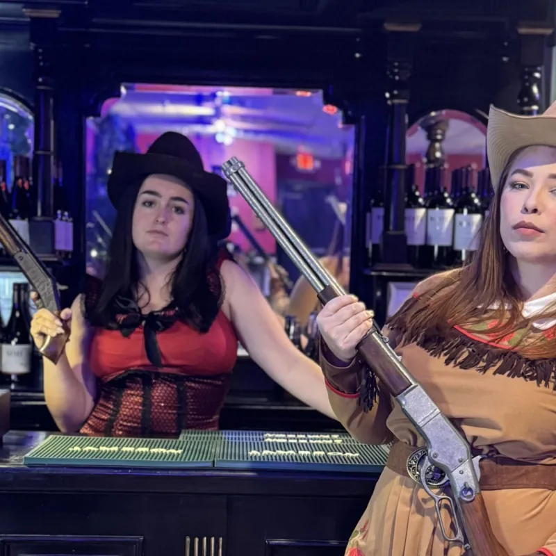 a woman standing in front of a stage